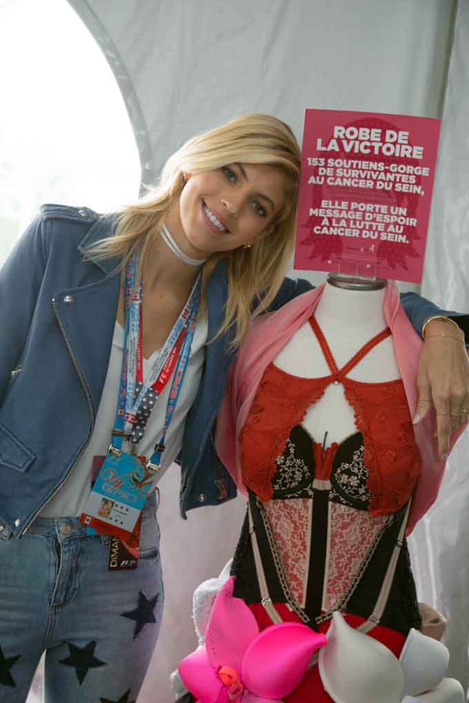 Devon Windsor, "Angel" Victoria Secrets model posing with La Robe de la Victoire