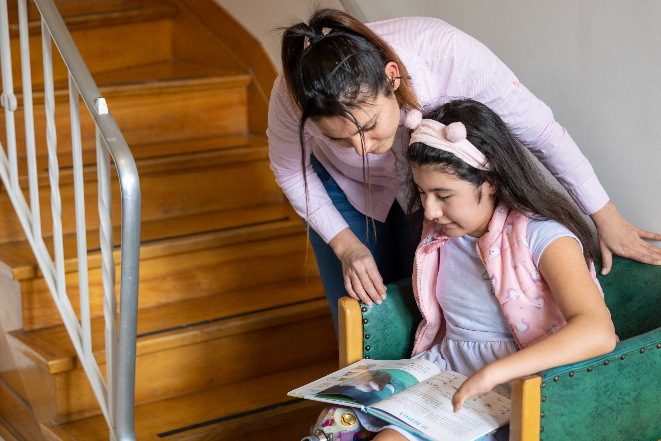 mother reading with daughter