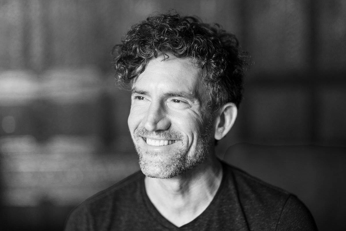 Portrait of a smiling gentleman facing window light Portrait of a smiling gentleman facing window light