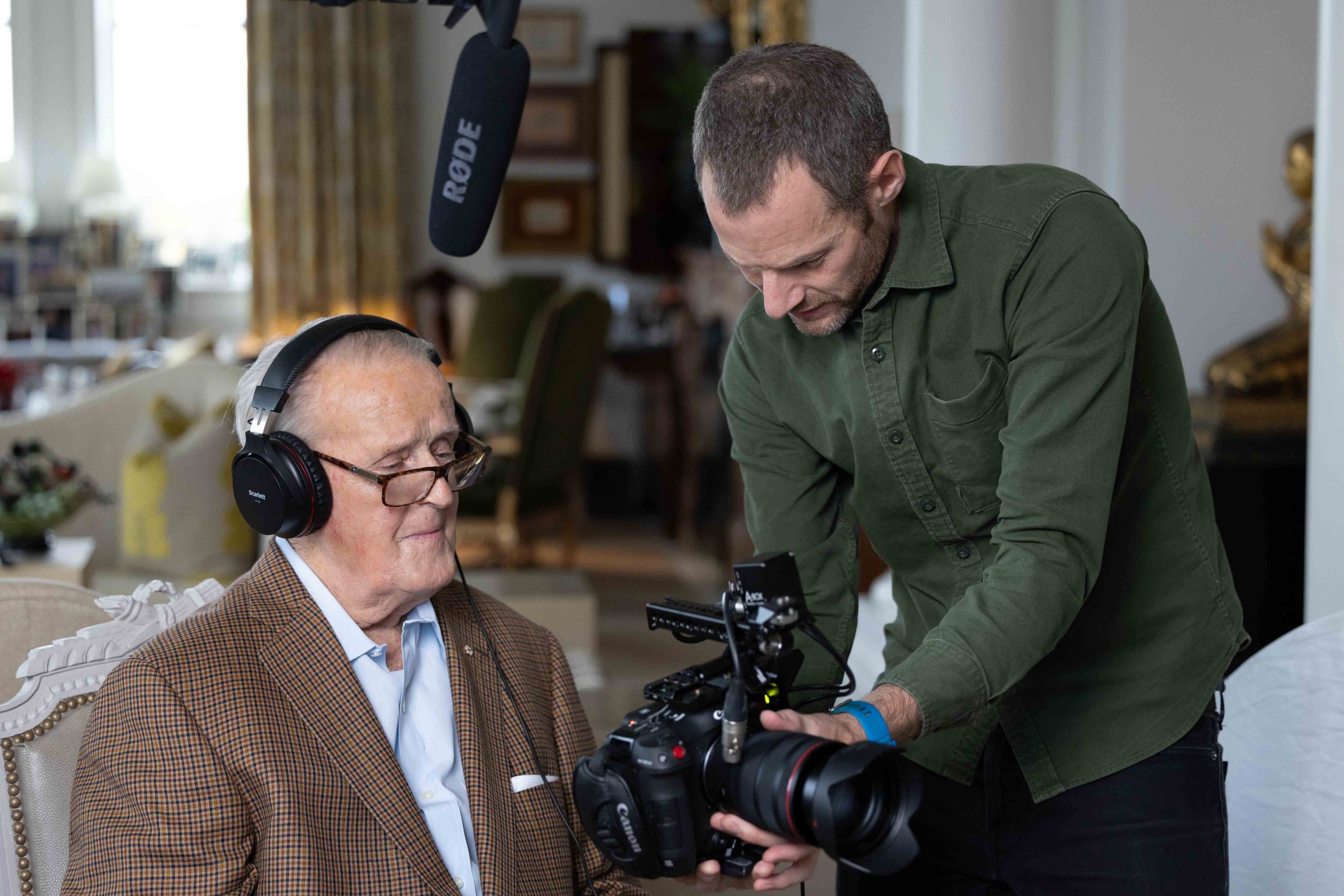 Jimmy Reynolds sharing video preview with the late Right Honourable Prime Minister Brian Mulroney on a video shoot for Julian Haber Creative