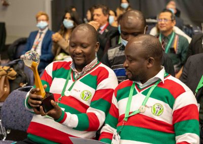 Delegates holding a biodiversity award during a side event at UN COP15, photo by Julian Haber.