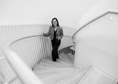 Julian Haber captures a professional in the iconic spiral staircase at Fednav Montreal, highlighting the architectural excellence of their workplace.
