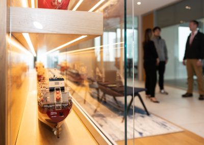 Julian Haber captures a detailed ship model at Fednav Montreal, connecting the company's modern office culture to its global maritime heritage.