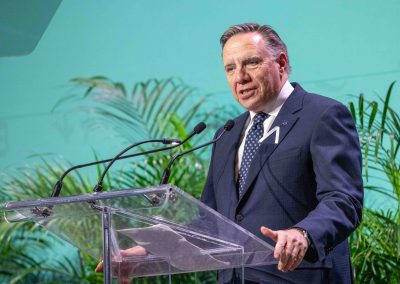 Premier François Legault speaking at the podium during opening ceremony of the UN COP15 summit in Montreal, photography by Julian Haber.