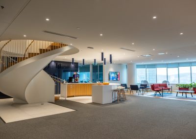 Julian Haber captures a wide architectural view of the Fednav Montreal office, showcasing the bright, ergonomic workspace and innovative design.