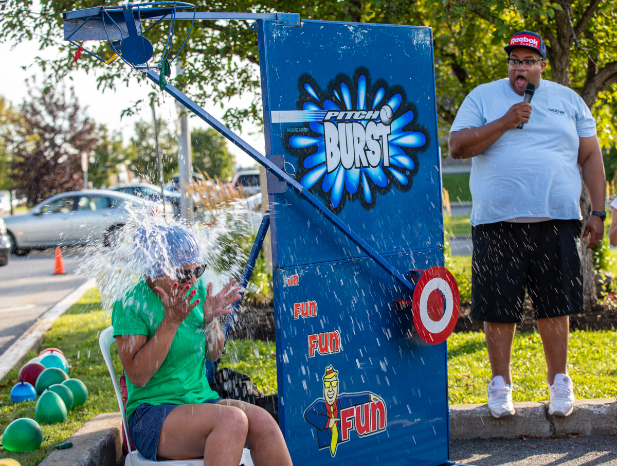julian-haber-photography-employer-branding-montreal-5 The ultimate moment of shock and surprise as a company executive participates in a water balloon company challenge by Julian Haber