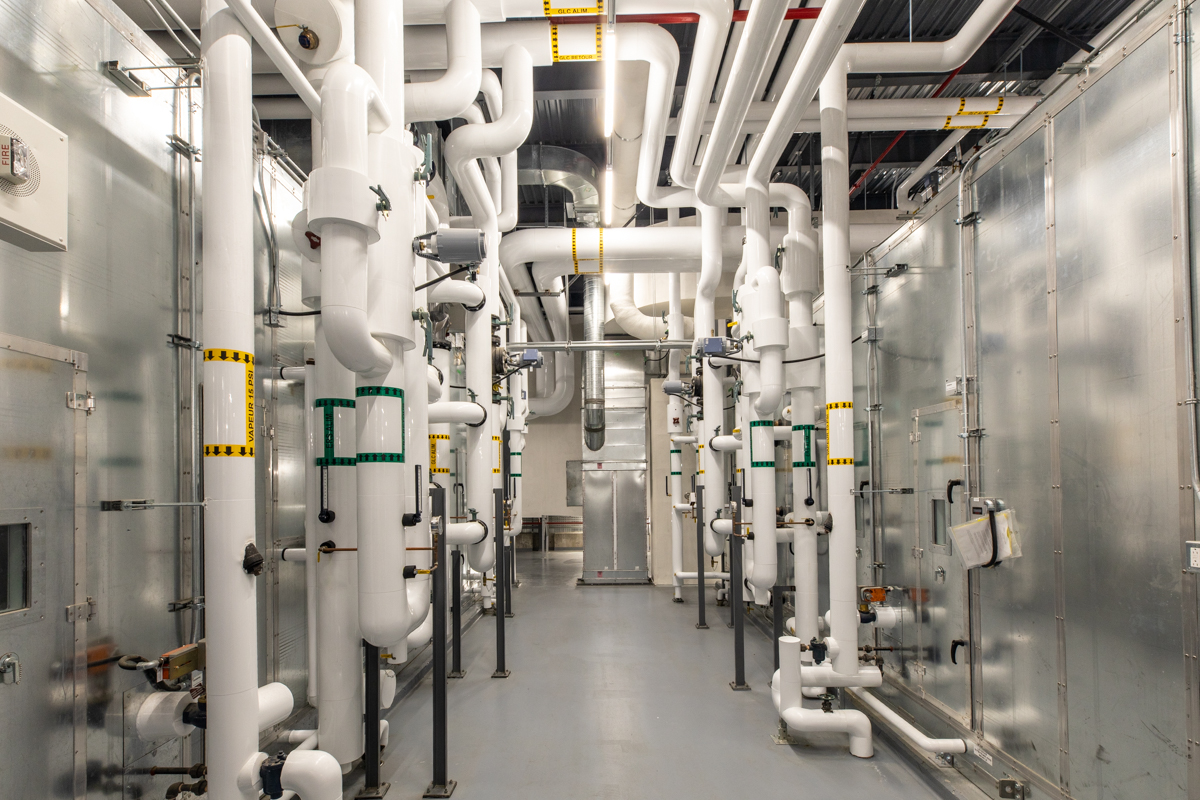 julian-haber-photography-facilities-real-estate-montreal-18 Employer Branding photography facilities showing complex plumbing job on new construction for Concordia University lab at Loyola Campus, NDG, by Julian Haber
