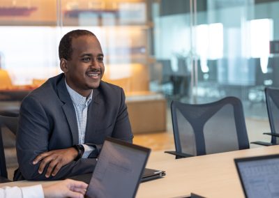 Julian Haber captures a focused team member at Fednav Montreal, illustrating the company's high-performance culture and technical dedication.