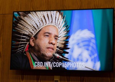 Julian Haber's official summit photography displayed on digital screens at the Palais des congrès.