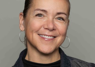 Corporate headshot of Intact Insurance employee - female in casual business attire.