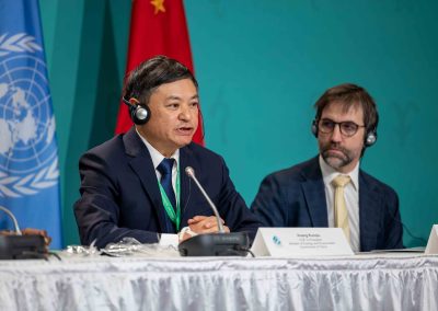 China's Minister of Ecology and Environment Huang Runqiu, in Montreal, Quebec, Canada December 19, 2022 at opening ceremony of UN-COP15 seated next to Canada's Environment Minister Stephen Guillebeault, by Julian Haber.